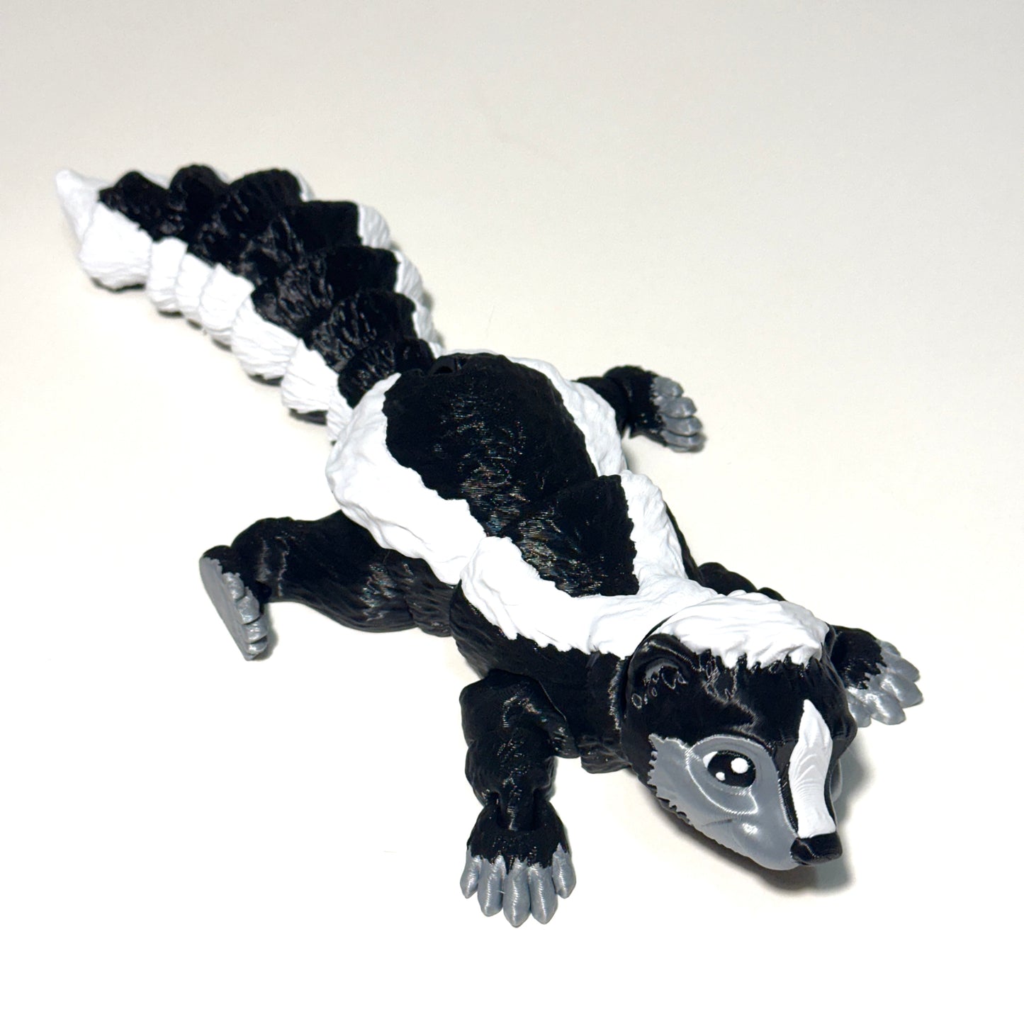 Flexi MMM Skunk - 3D Printed Articulating Figure